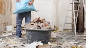 Person creating DIY Waste by doing demolition work at their residence