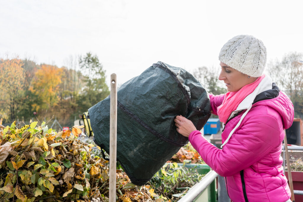 Resident disposing of waste after booking through hwrc booking system